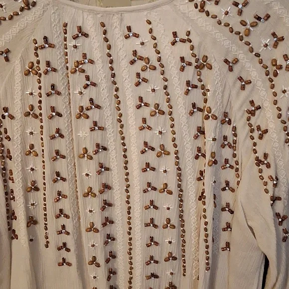 Chicos Cream Tunic Featuring Gold, Wood, And Embroidered Embelishments - Picture 3 of 8